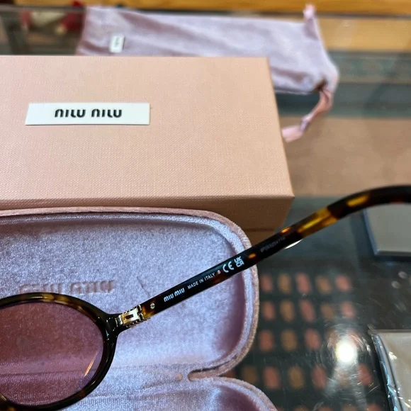 Miu Miu Tortoiseshell Sunglasses with Purple Lenses - Picture 6 of 7